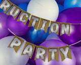 Decorative banner with 'RUCTION PARTY' text among colorful balloons.