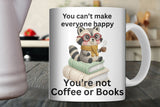 Mug with a raccoon illustration and humorous text on a kitchen counter.