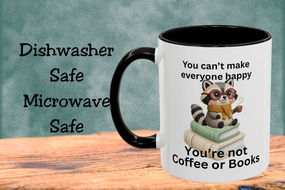 Mug with a raccoon illustration and text on a wooden surface