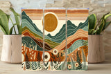 Three notebook covers with a mountain and nature-themed design on a wooden surface.