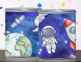 Two cylindrical containers with space-themed designs featuring Earth, an astronaut, and a rocket.