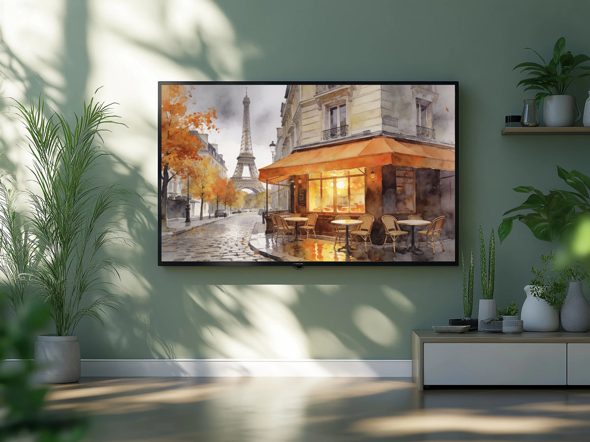 TV mounted on a wall displaying an image of a Parisian street scene with the Eiffel Tower.