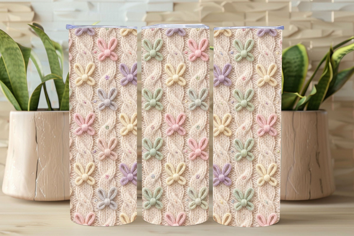 Decorative notebook with floral pattern on a wooden surface with plants in the background