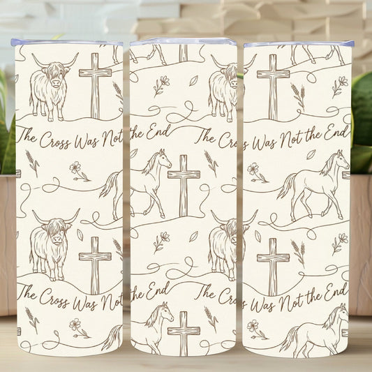 Three TUMBLERS with animal illustrations and cross designs on a wooden surface.