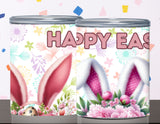 Two cans with Easter-themed designs featuring bunny ears and flowers on a colorful background.