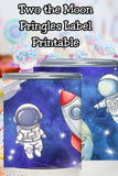 Two the Moon space birthday party idea 🚀 These adorable Pringles can labels and lid toppers make the cutest astronaut party favors for a second birthday. Perfect for a space birthday or spaceship birthday theme and so easy to print and assemble.