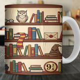 Mug with a design of books, an owl, and a Sorting Hat on a wooden shelf.