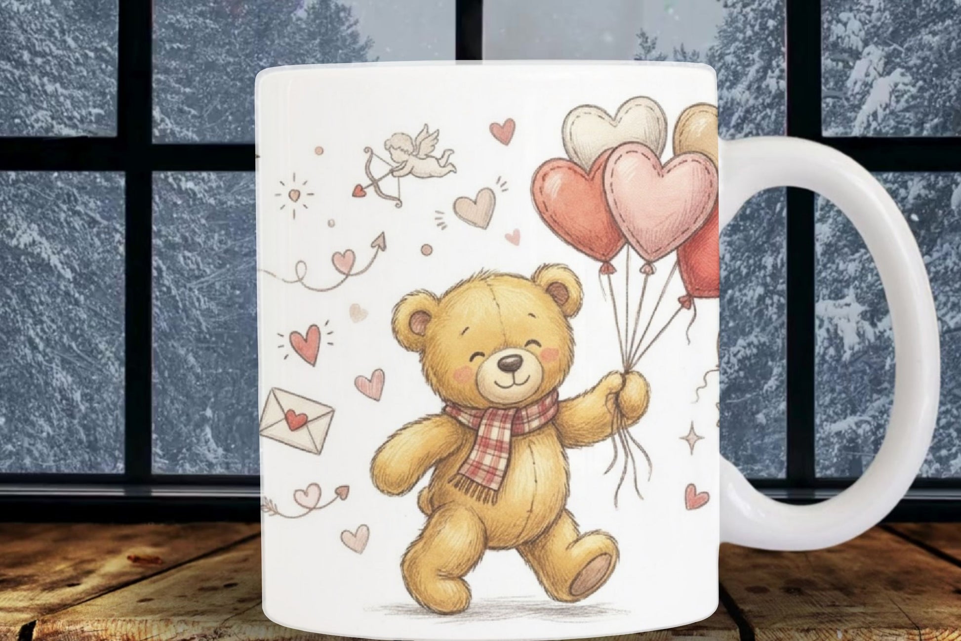 Mug with a teddy bear holding balloons and hearts design on a wooden surface.
