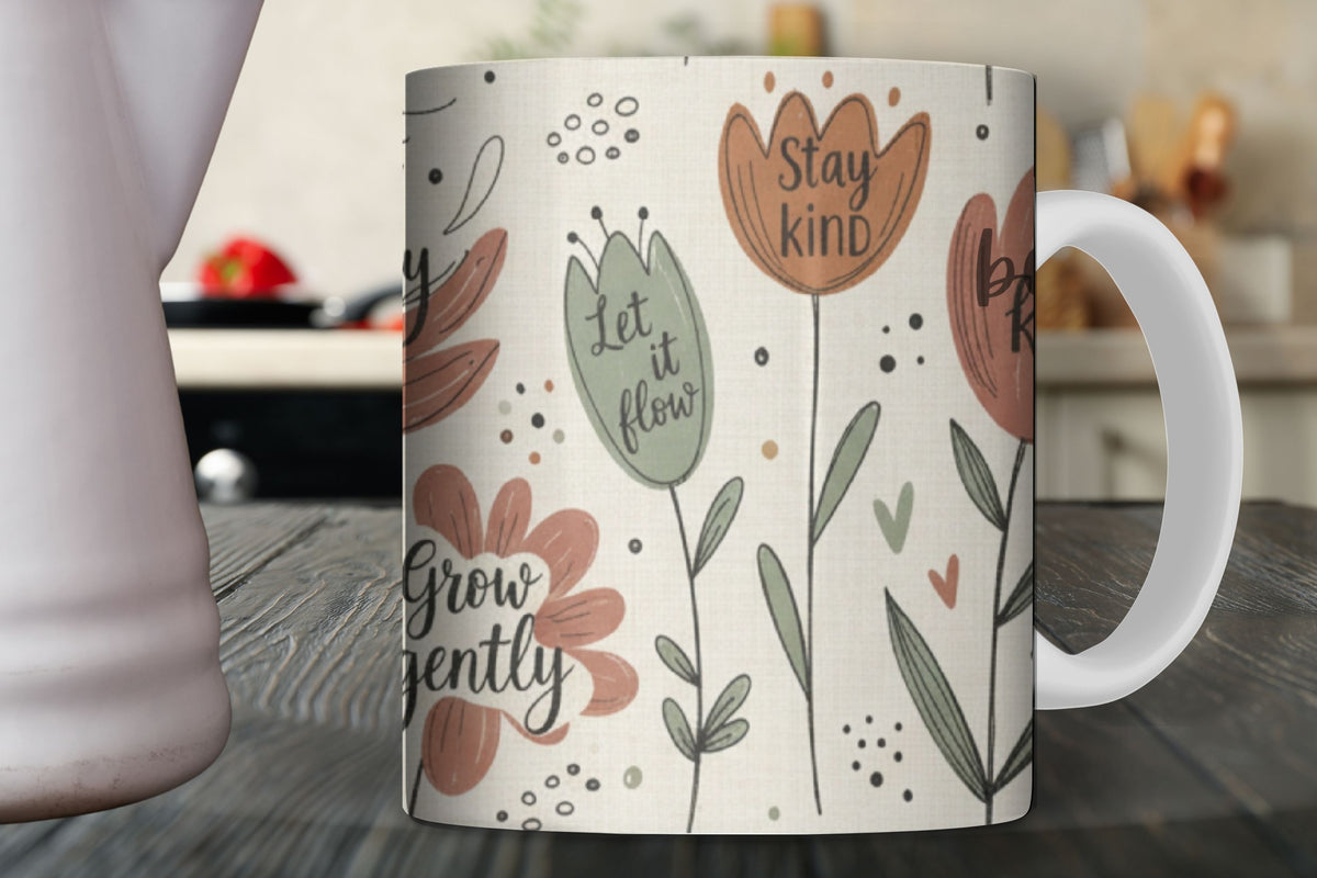 Mug with floral design and motivational phrases on a wooden surface