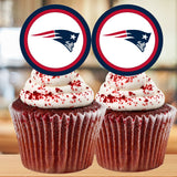 Two cupcakes with red velvet cake and white frosting, topped with New England Patriots logo, on a blurred background.