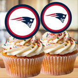 Two cupcakes with New England Patriots logo toppers on a wooden surface.