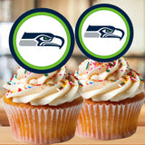 Two cupcakes with white frosting and colorful sprinkles, topped with Seattle Seahawks logo toppers.