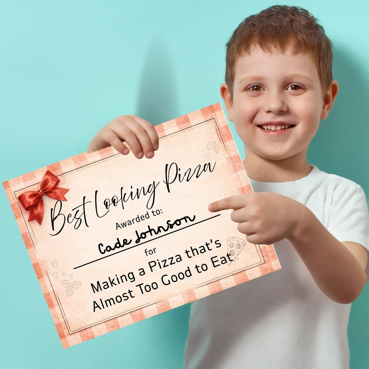 Child holding a certificate titled 'Best Looking Pizza' against a light blue background