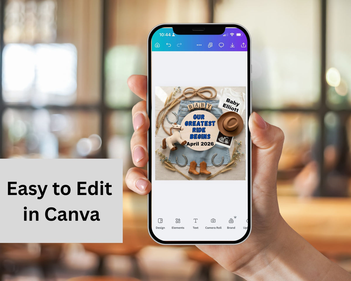 Hand holding a phone displaying a baby shower invitation design on Canva with blurred indoor background.