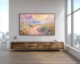 Framed artwork of a floral landscape on a wall above a wooden console table with cityscape view.