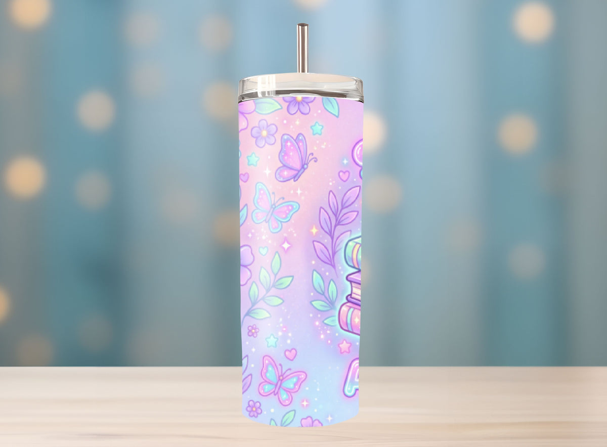 Pastel-colored tumbler with butterfly design on a blurred background