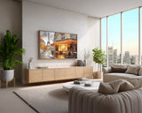 Modern living room with a cityscape painting on the wall, large windows, and stylish furniture.
