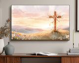 Framed artwork of a cross on a hill with a sunset in a living room setting.