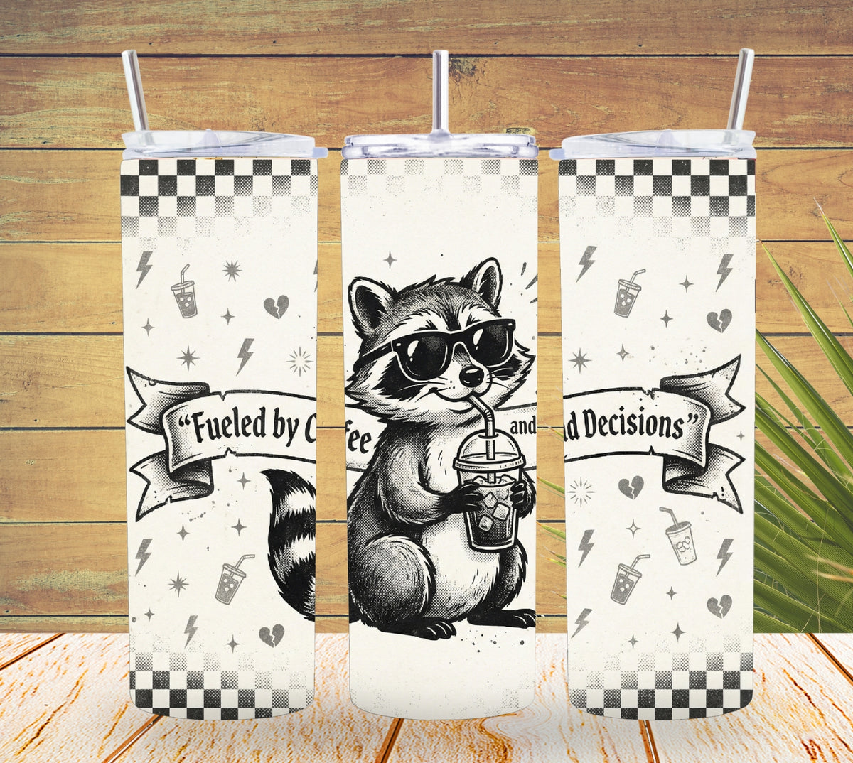 Three tumbler designs with a raccoon wearing sunglasses and text on a wooden background.