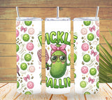Three tumblers with pickle-themed designs on a wooden background