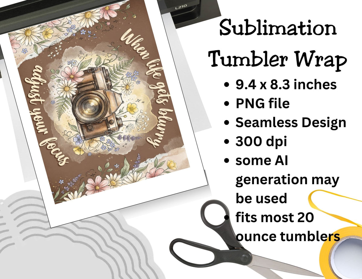 Sublimation tumbler wrap design with camera and floral elements, scissors, and tape on a white background.