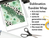 Sublimation tumbler wrap with green and black pattern, printer, and scissors on a white background