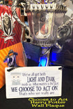 Show your love of Harry Potter with this plaque hanging in your home or office as the perfect Harry Potter gift idea or fandom love.   Plaque has white  and grey background with a graphic of Dumbledore in the top right corner.  Plaque reads "We've all got both light and dark inside of us. What matters is the part we choose to act on. That's who we really are."