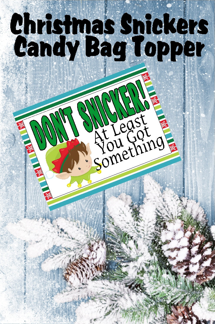 Wish your family and friends a Merry Christmas with this printable to and from tag in the form of a bag topper.  Add some yummy Snickers to a bag and top with this bag topper, then add a to and from greeting on the back.  Tie to a present and give as a sweet treat.