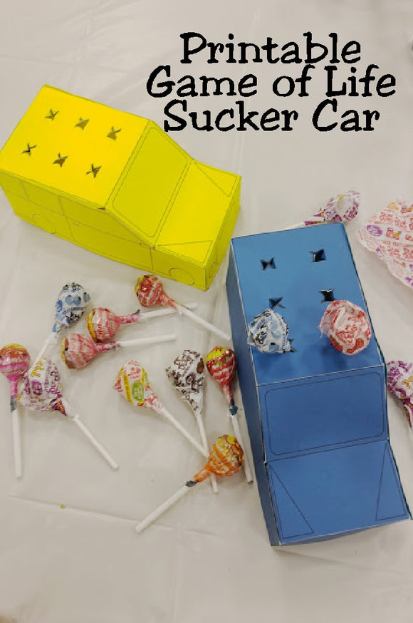 Drive up to the dessert table and away with the fun with this printable Game of Life car that is perfect for holding lollipop candy party treats at your Game Night party.  This printable car looks just like the game piece and instead of holding your family as you roam around the board game, you'll enjoy a yummy candy treat instead.