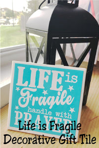 Life is fragile handle with prayer.  Keep this decorative plaque by your bed to help you always remember to pray before the storms of life hit.  Prayer quote comes in several different size plaques and even a refrigerator magnet 