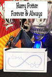Show your love of Harry Potter with this plaque hanging in your home or office as the perfect Harry Potter gift idea or fandom love.  Plaque has a white background with a navy blue border  Inside border is a silver grey infinity symbol.  On top left of symbol reads "Always" while bottom right has Harry Potter glasses and a lightining bolt.
