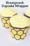 Make your dessert table Bee something special with these honeycomb printable cupcake wrappers. They are such a simple and fun way to add a little bit of something extra to your next bee party.