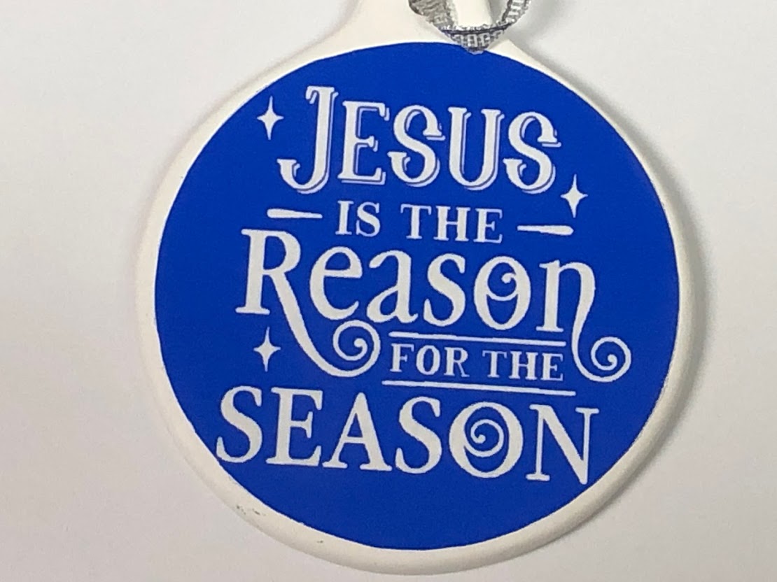 Kneeling Santa Baby Jesus Christmas Ornament