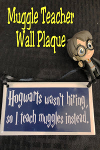 Your favorite  "Potterhead" teacher will love this wall plaque as a gift anytime of year.  Plaque has a navy blue background with the wording "Hogwarts wasn't hiring so I teach muggles instead" in a fun Harry Potter style font.