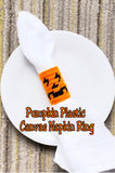 Create a fun Halloween party decoration for your dinner table with this fun pumpkin face napkin ring.  Ring is an easy Halloween craft to make if you know the basics of plastic canvas.
