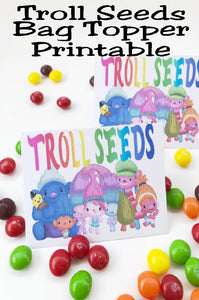 These Troll Seeds bag toppers are the perfect give for our Trolls birthday party! They are quick and easy to put together and so stinkin' cute. Print them out now and bring a smile with Princess Poppy and the Trolls squad.
