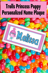 There will be sunshine and rainbows everywhere when you have this Princess Poppy personalized name plaque hanging at your Trolls birthday party or your Trolls bedroom.