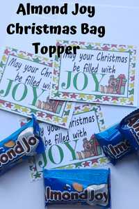 Wish your family and friends a joyful Christmas with this printable bag topper.  Add some yummy Almond Joys to a bag and top with this bag topper. This would make a great to and from greeting Tag by adding your info on the back.  Tie to a present and give as a sweet treat.