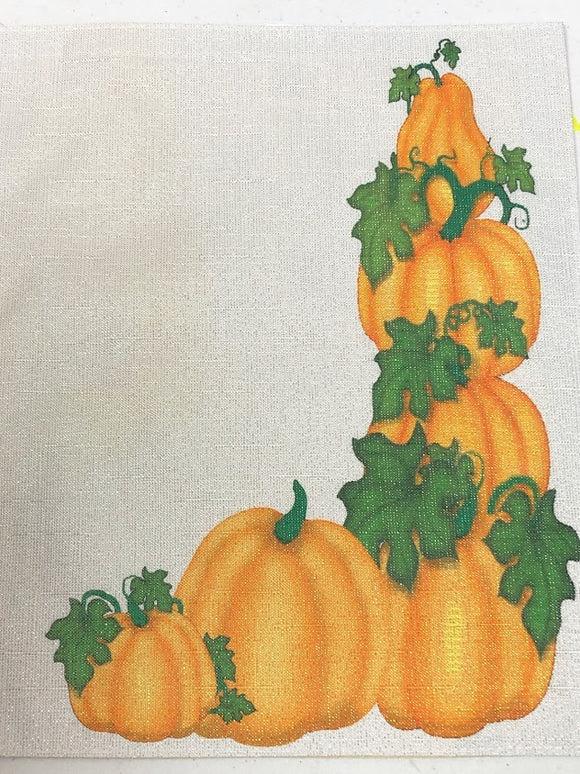 Decorate your table with these beautiful pumpkin pieces.  They make the perfect addition to a Thanksgiving dinner party, a fall dinner party, or a Halloween party with their cute stacked pumpkins on Place mats and napkins.